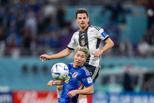 Takuma Asano of Japan and Jonas Hofmann of Germany