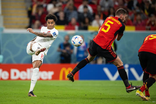 Tajon Buchanan of Canada and Jan Vertonghen of Belgium