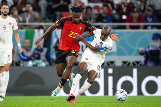 Michy Batshuayi of Belgium and Atiba Hutchinson of Canada
