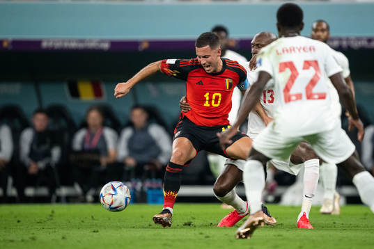 Eden Hazard of Belgium and Atiba Hutchinson of Canada