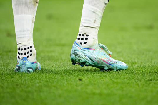 Alistair Johnston of Canada’s shoes with rainbow details