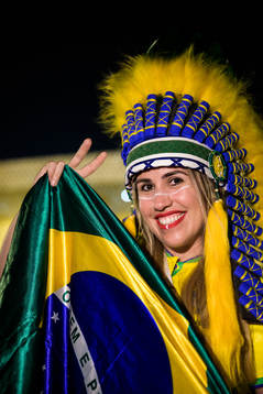 A Brazilian fan poses for a portrait