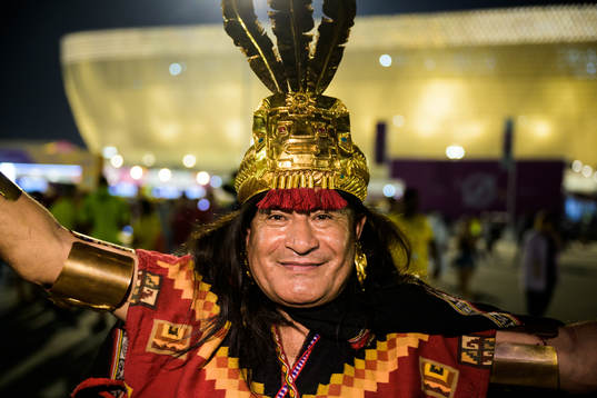 A fan poses for a portrait