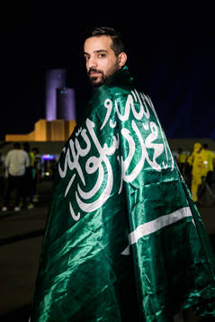 A Saudi Arabian fan poses for a portrait