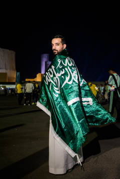 A Saudi Arabian fan poses for a portrait