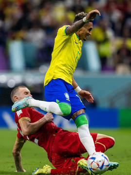 Strahinja Pavlovic of Serbia and Raphinha of Brazil