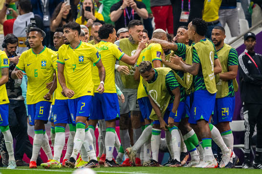 Richarlison of Brazil celebrates with team mates