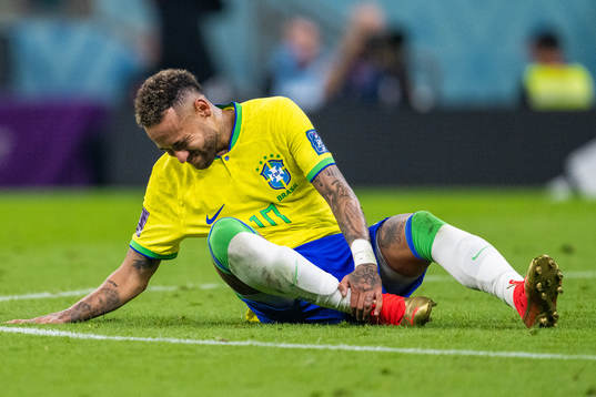 Neymar of Brazil in pain