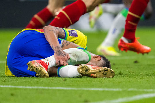 Neymar of Brazil in pain