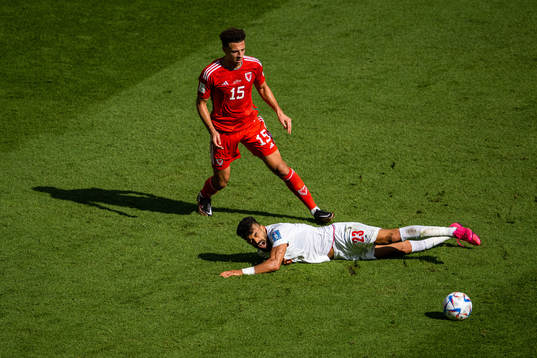 Ethan Ampadu of Wales and Ramin Rezaeian of Iran