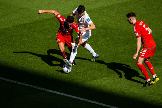Ethan Ampadu and Chris Mepham of Wales against Saeid