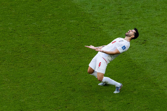 Saeid Ezatolahi of Iran looks dejected