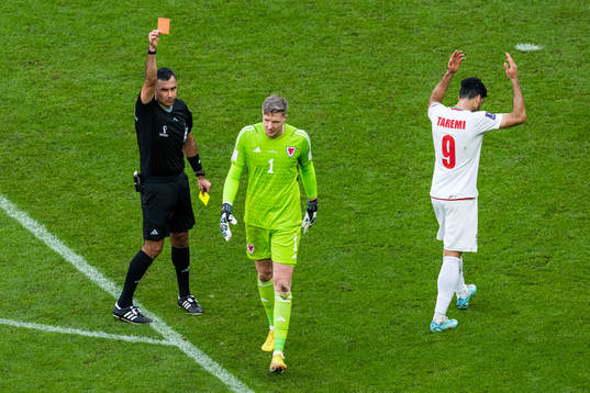 goalkeeper Wayne Hennessey of Wales receives a red card