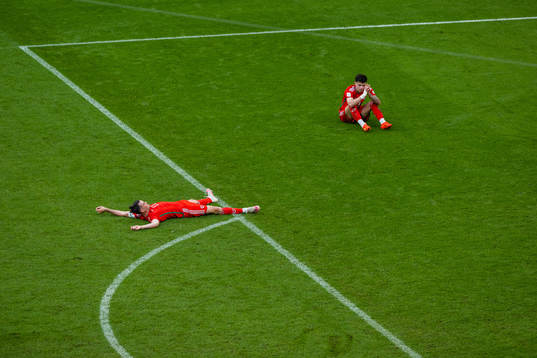 Gareth Bale and Neco Williams of Wales look dejected