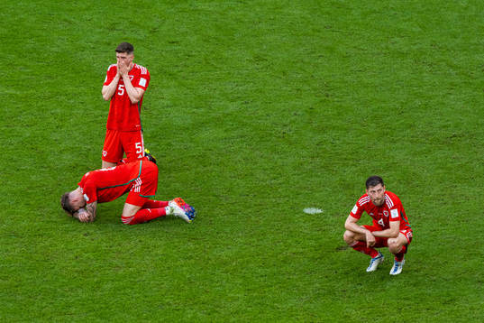 Joe Rodon, Chris Mepham and Ben Davies of Wales look