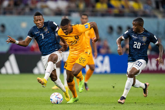 Pervis Estupinan and Jhegson Mendez of Ecuador against