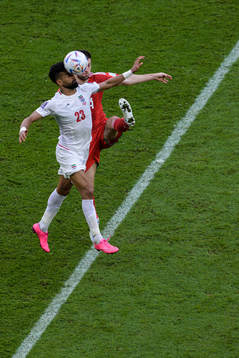 Ramin Rezaeian of Iran and Ben Davies of Wales