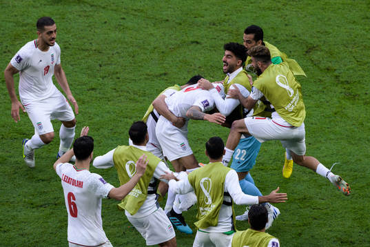 Players of Iran celebrate