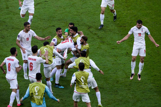 Players of Iran celebrate