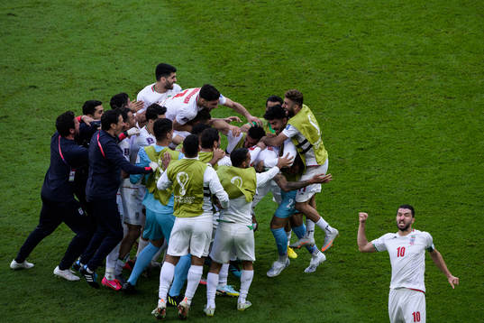Players of Iran celebrate