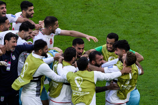 Players of Iran celebrate