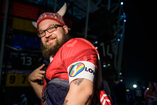 A Denmark fan poses with an One Love armband