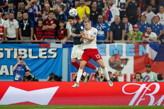 Theo Hernandez of France and Rasmus Kristensen of Denmark