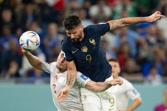 Victor Nelsson of Denmark and Olivier Giroud of France