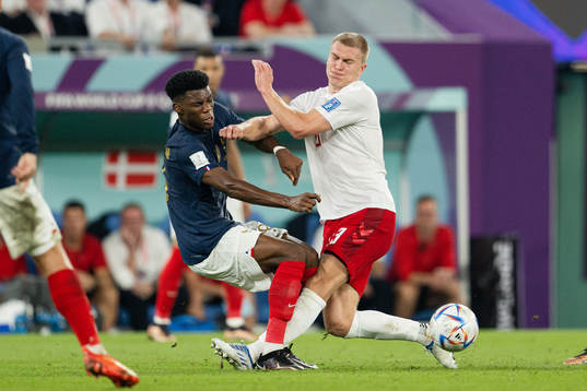 Aurelien Tchouameni of France and Rasmus Kristensen of