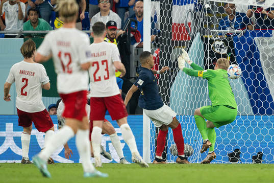 Kylian Mbappe of France scores the 2-1 goal behind