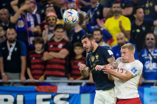 Theo Hernandez of France and Rasmus Kristensen of Denmark