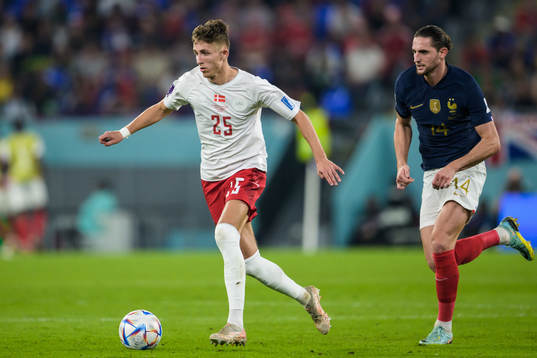 Jesper Lindstrøm of Denmark and Adrien Rabiot of France