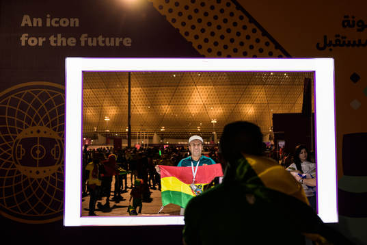 A spectator gets his picture taken