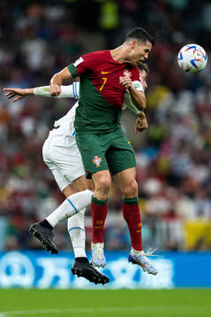 Cristiano Ronaldo of Portugal and Rodrigo Bentancur of