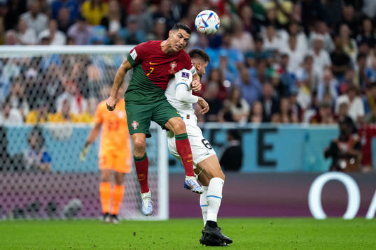 Cristiano Ronaldo of Portugal and Rodrigo Bentancur of