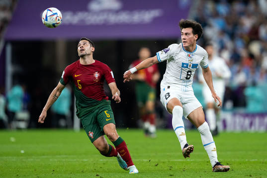 Raphael Guerreiro of Portugal and Facundo Pellistri of