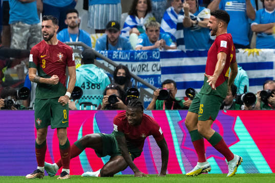 Bruno Fernandes of Portugal celebrates with Rafael Leao and
