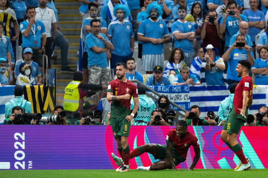 Bruno Fernandes of Portugal celebrates with Rafael Leao and