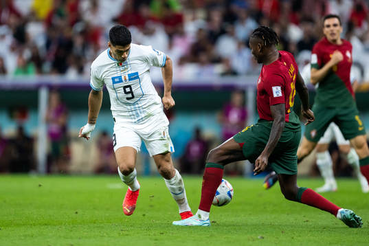 Luis Suarez of Uruguay and Rafael Leao of Portugal