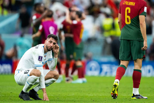 Rodrigo Bentancur of Uruguay looks dejected