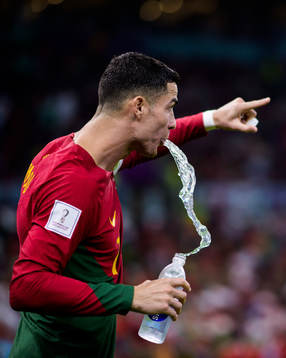 Cristiano Ronaldo of Portugal spits water
