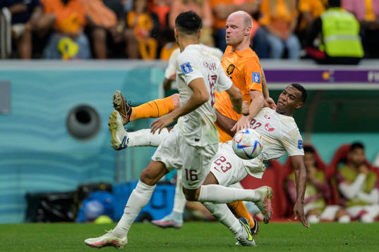 Boualem Khoukhi and Assim Madibo of Qatar against Davy