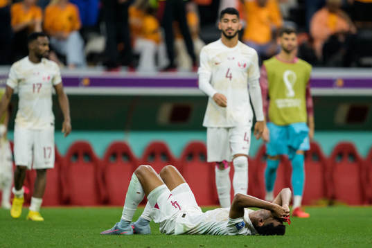 Homam Ahmed of Qatar looks dejected