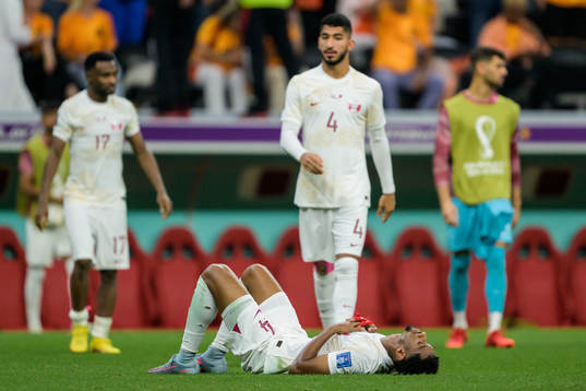 Homam Ahmed of Qatar looks dejected