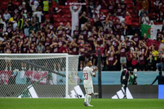 Assim Madibo of Qatar looks dejected