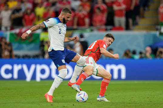 Kyle Walker of England and Daniel James of Wales