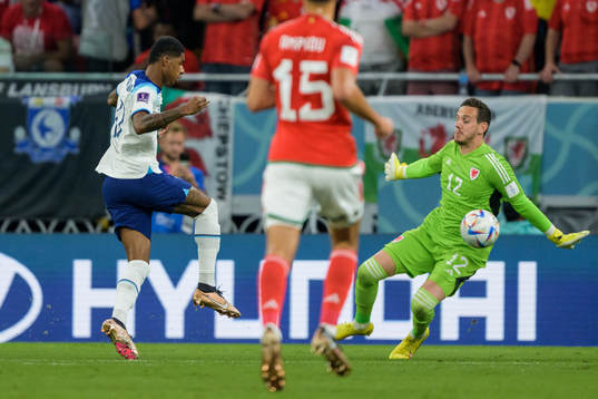 Marcus Rashford of England and goalkeeper Danny Ward of