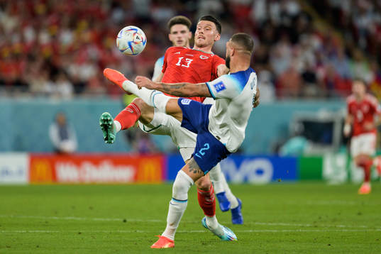 Kieffer Moore of Wales and Kyle Walker of England
