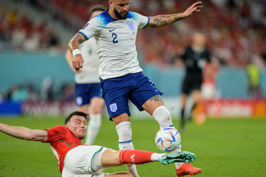 Kieffer Moore of Wales and Kyle Walker of England