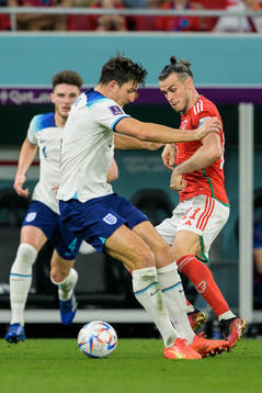 Harry Maguire of England and Gareth Bale of Wales